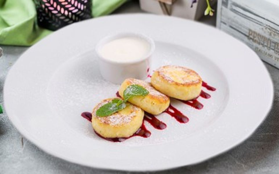 Фото Ванільні сирники в Pesto Cafe